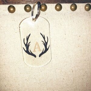 A MONOGRAMMED deer antler keychain
